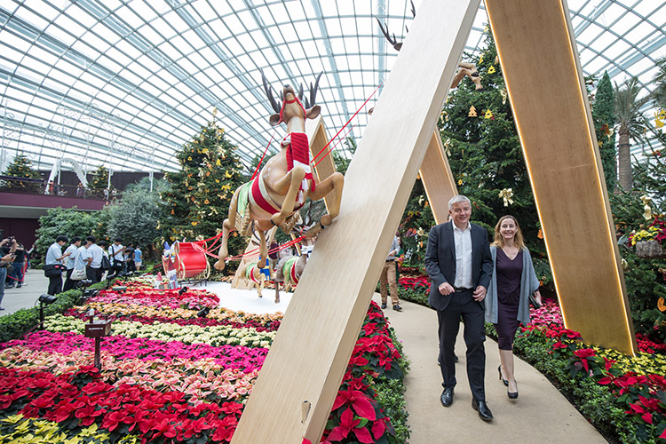Ambassador of Denmark to Singapore Her Excellency Dorte Bech Vizard and her husband Mr Jotham Vizard at Gardens by the Bay’s Poinsettia Wishes floral display, which draws inspiration from the Nordic region this year.